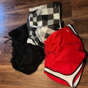 Three pair of Nike running shorts